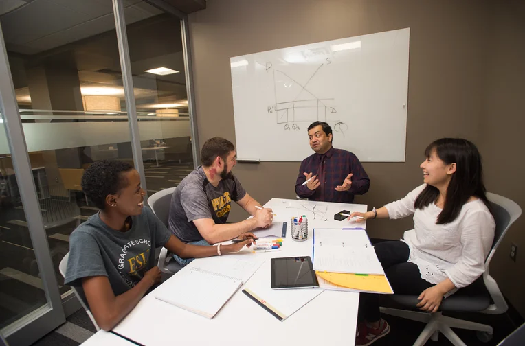 Emporia State students studying in conference room