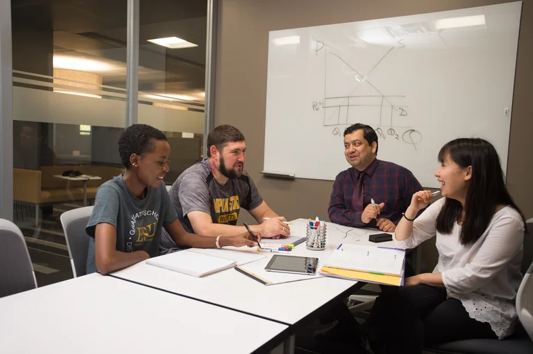 Students meeting in a conference room