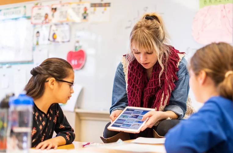 Emporia State Teachers College student working with children