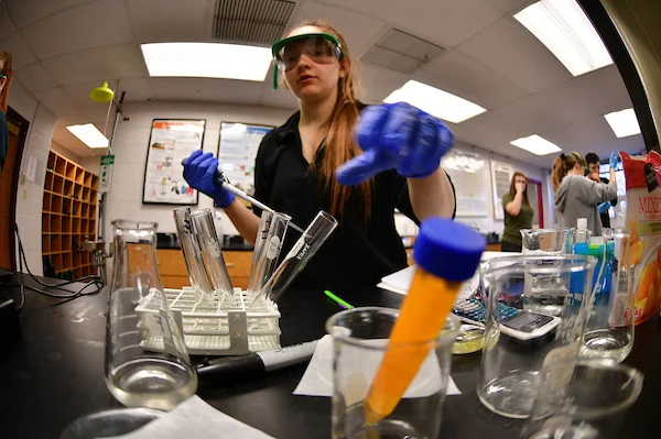 Student performing research in Emporia State University Biochemistry Lab