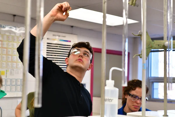 Student performing research in Emporia State University Biochemistry Lab