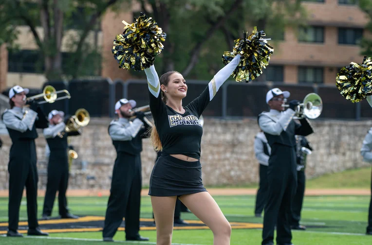 Marching Hornets and Stingers Dance Team performing