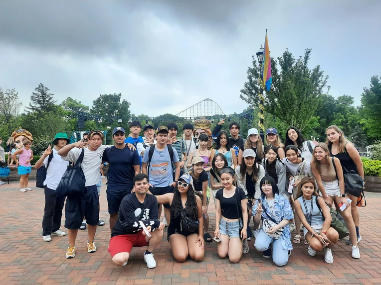 Summer Institute students pose for photo with disc golf discs