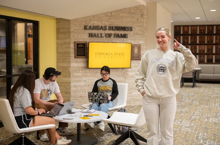 Woman in Kansas Business Hall of Fame with friends