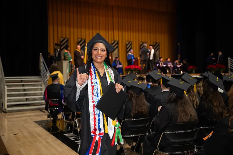Student Walking at Graduation