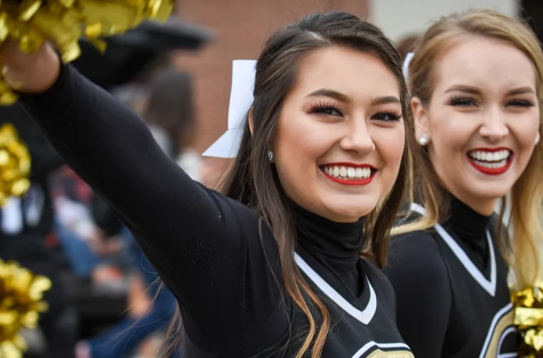 Emporia State cheerleaders smiling