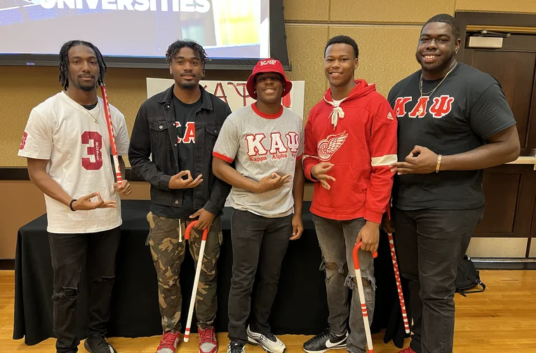 Fraternity members posing for photo