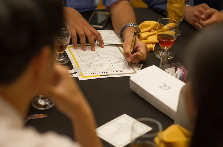 Emporia State students writing on paper