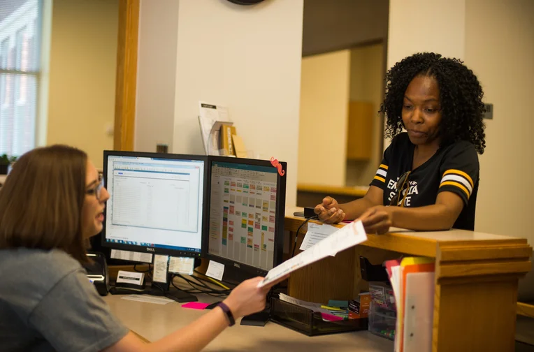 Emporia State student talking to advisor