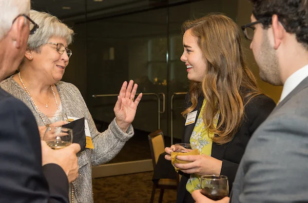 Students talking at event