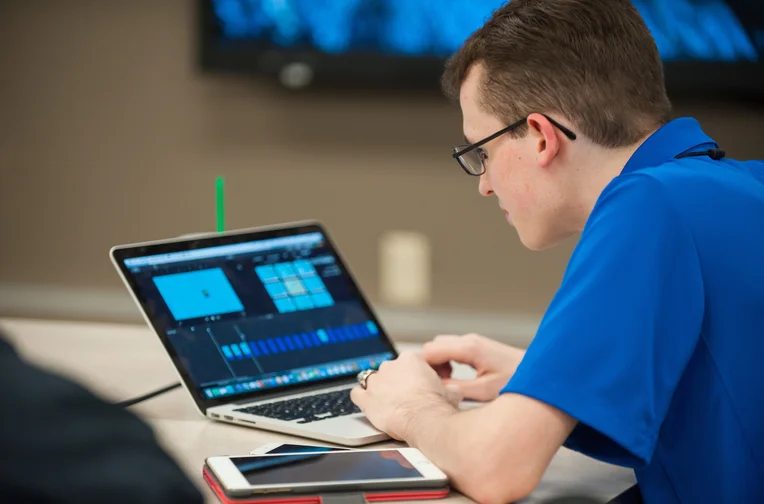 Emporia State student working on laptop