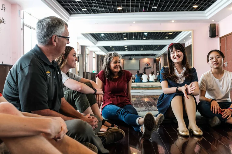 Students conversing in Beijing