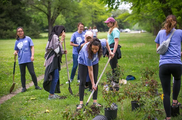 Students planting trees on Arbor Day