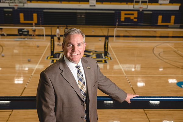 Man stands in basketball facility